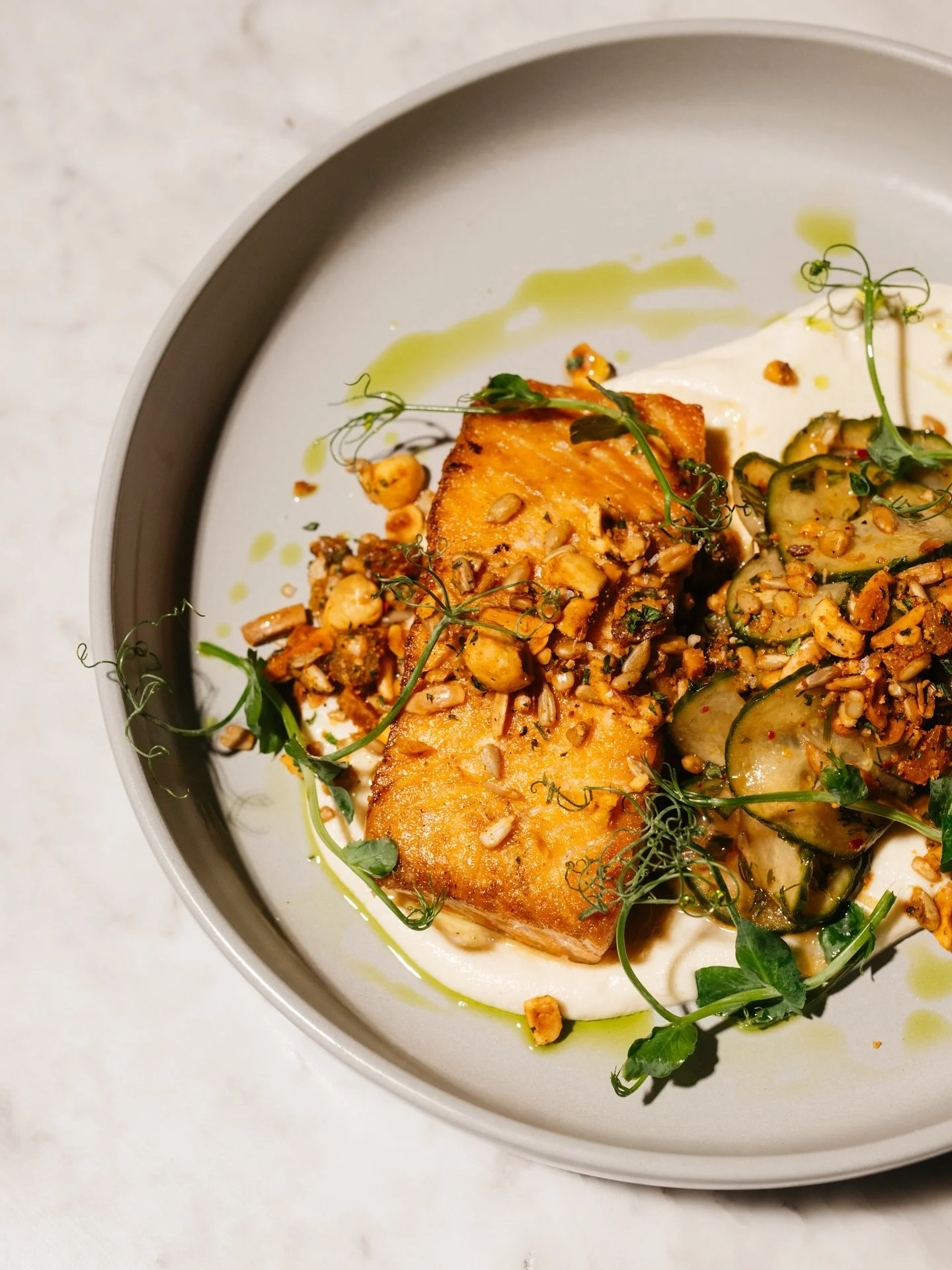 Golden seared salmon meets creamy celery root purée, crisp marinated cucumbers, and our house-made sunflower dukkah.
#geistnashville #nashvilletn #nashvilleeats