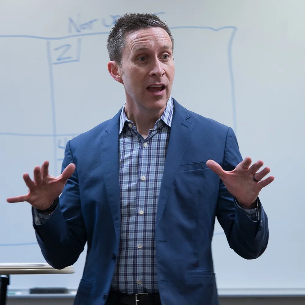 Dr. Michael Brown of DMB Coaching speaking at a BBLA.