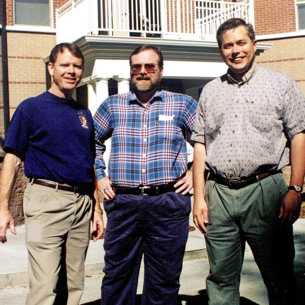 Brother Paul Allen (Washington State University, ‘75) (center), flanked by Brother Mike Flood (Washington State University, ‘72) (left) and Brother Bert Kolde (Washington State University, ‘76) (right) at the WSU Chapter House dedication in 1996.