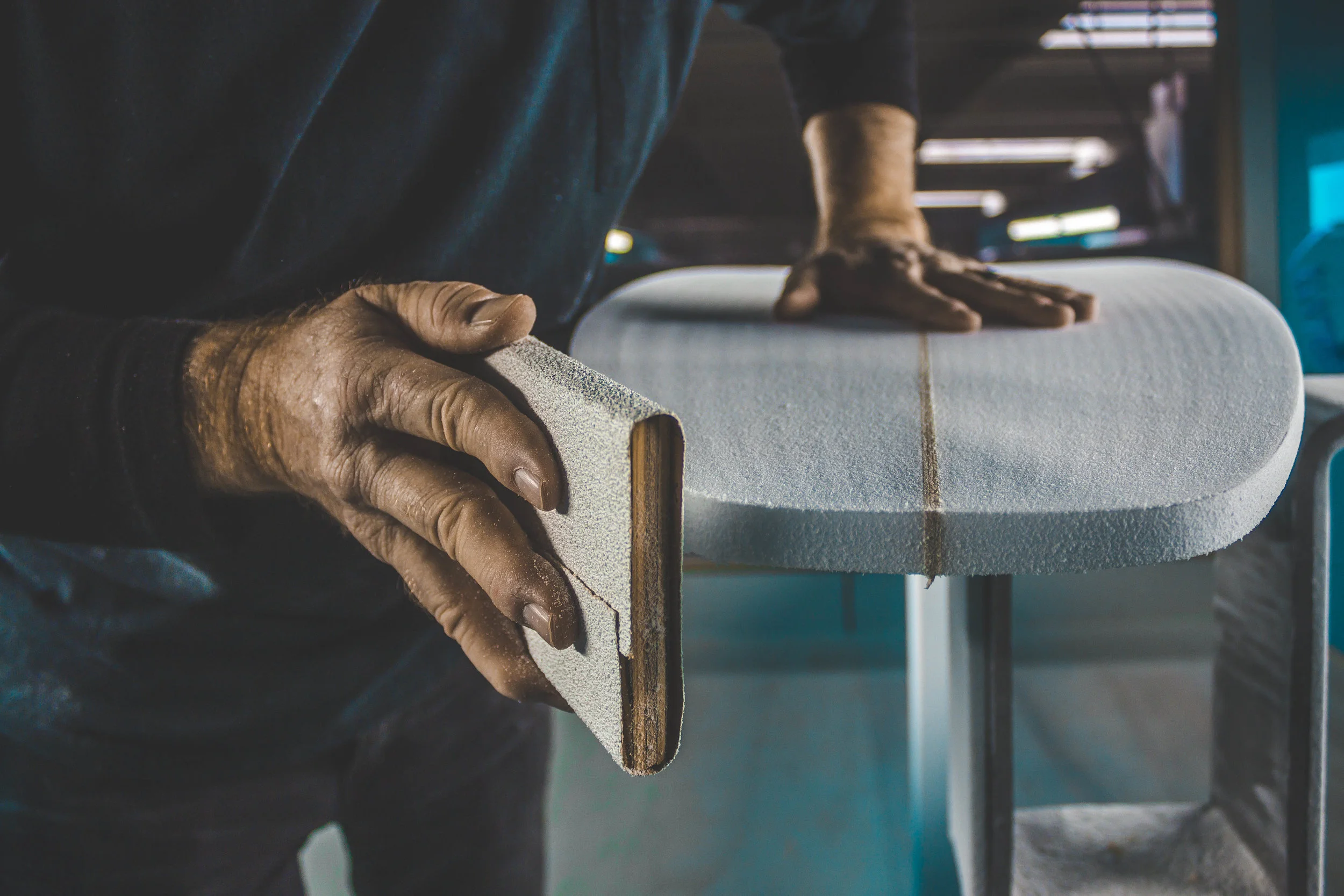 sanding tail of board (1 of 1).jpg