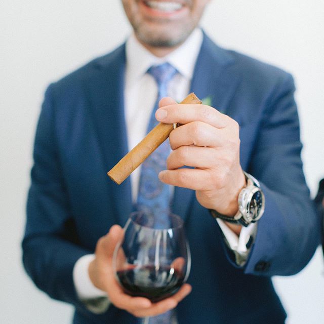 Pre-ceremony festivities are not just for the ladies! This groom treated his guys to a glass of his favorite @caymuscab wine and a cigar pre ceremony. Classy dude! Design and planning @starhansenevents. Venue @montagelaguna. florals @shawnayamamoto. 