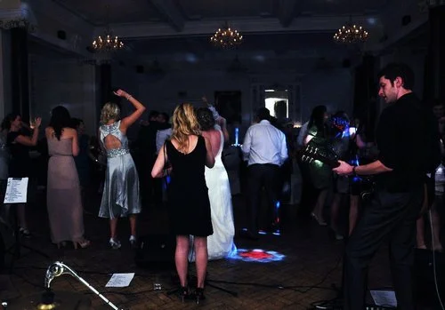 Bride on the dance floor at wedding in Warwickshire