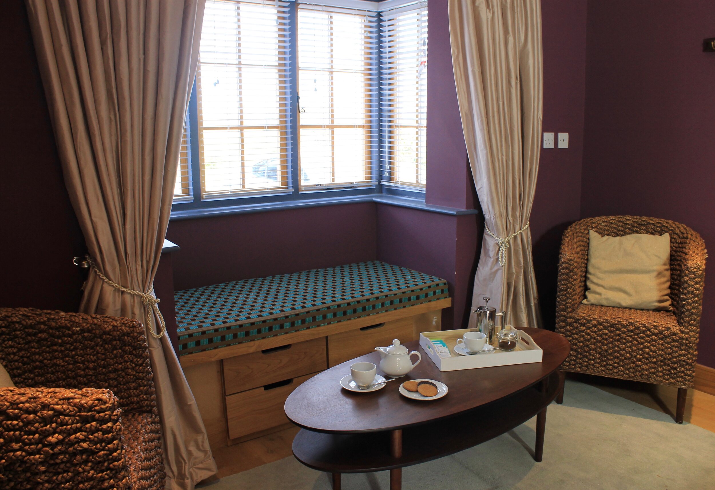 seating area in bedroom- the lodge at hemingford grey house.jpg