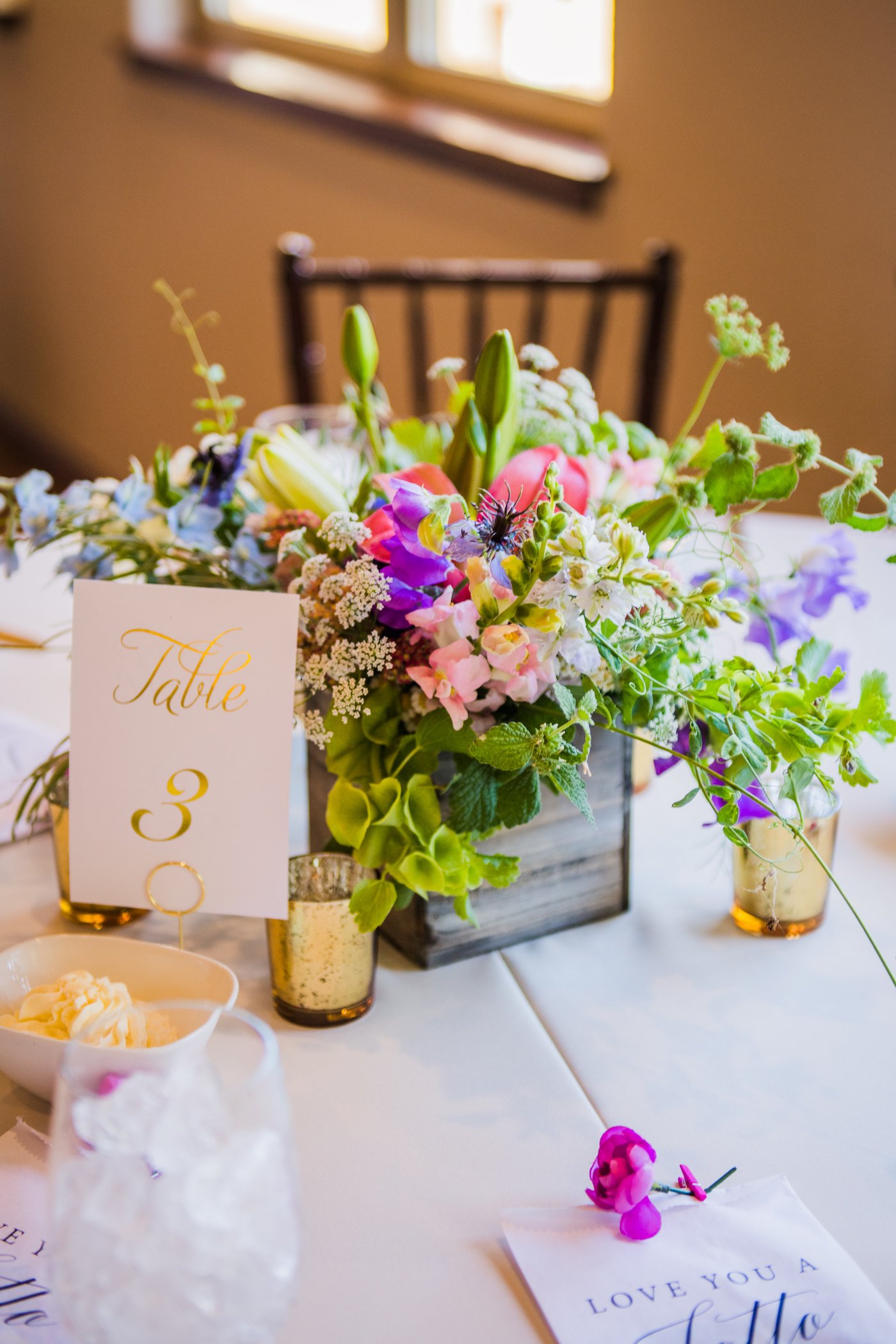 Romantic colorful garden wedding centerpiece