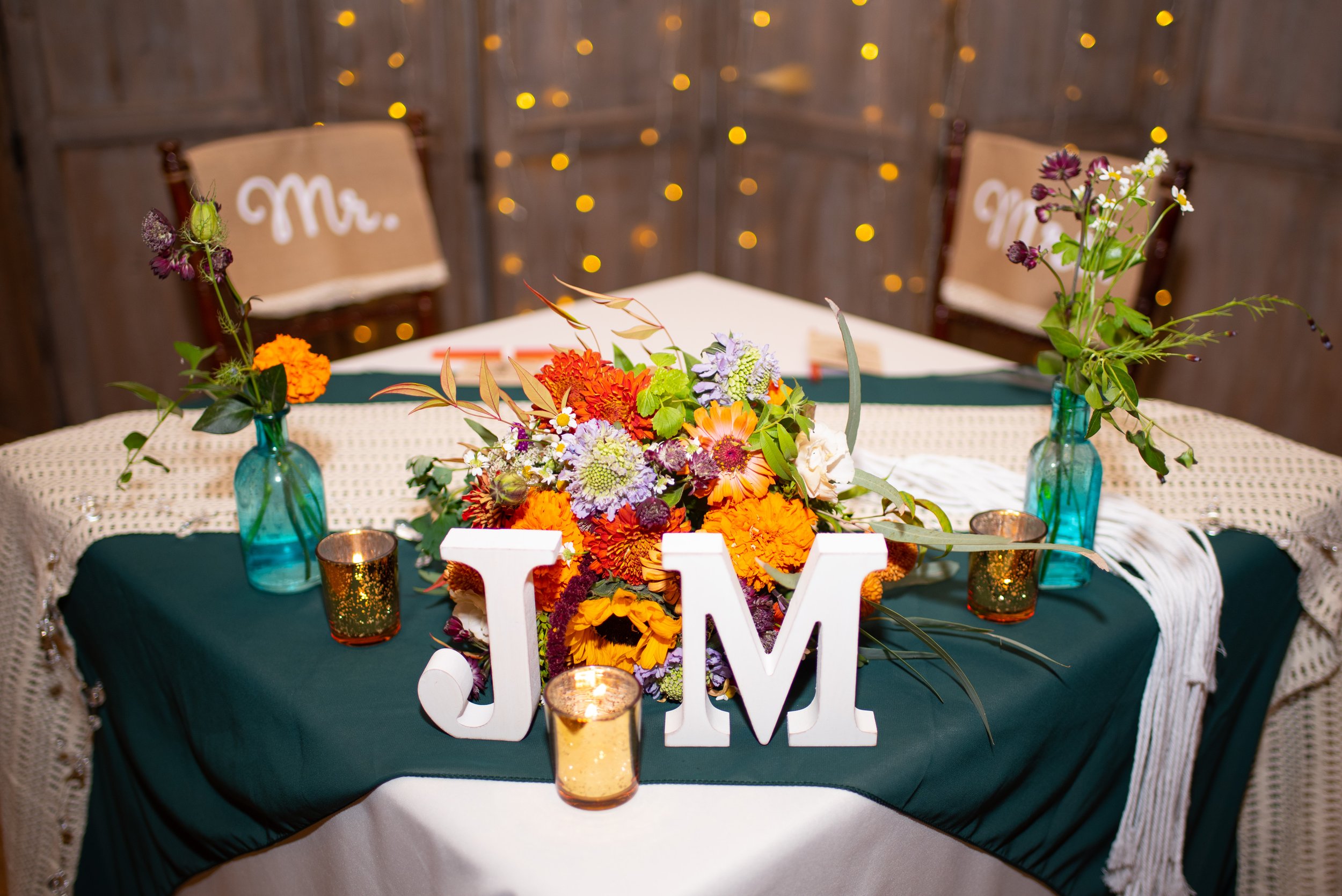 Vibrant autumn fairytale wedding sweetheart table