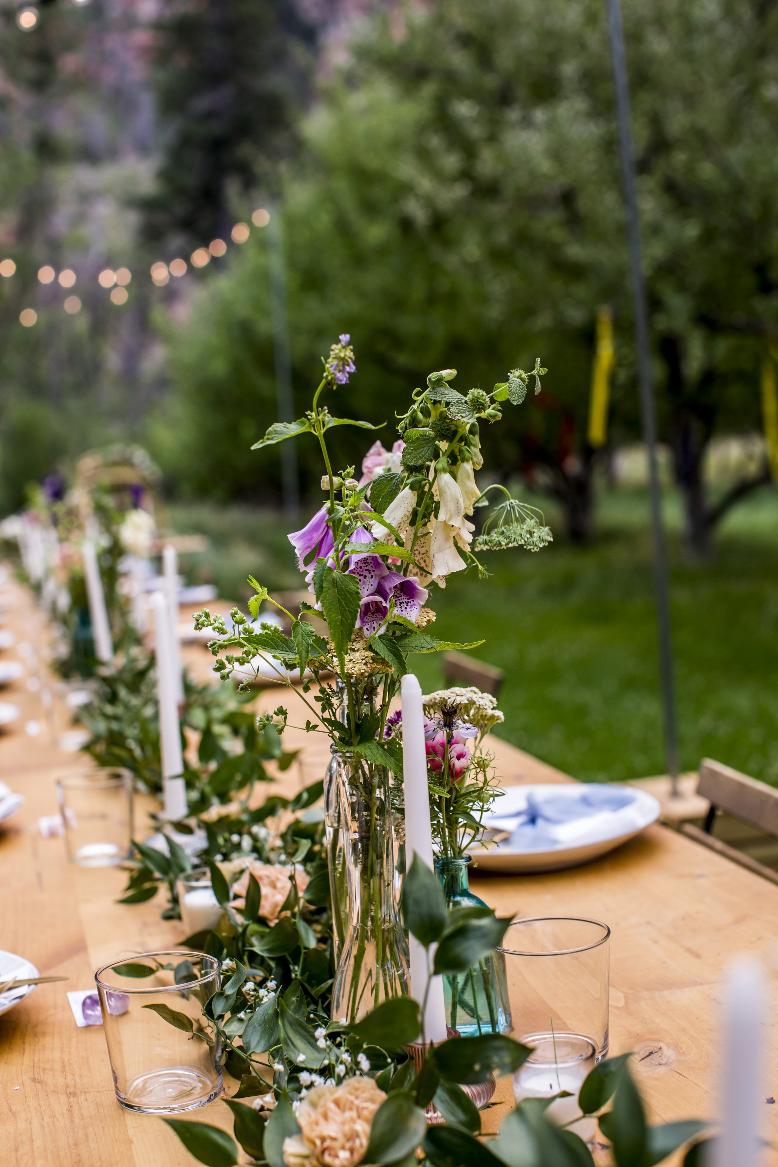 Romantic summer solstice orchard wedding table decor
