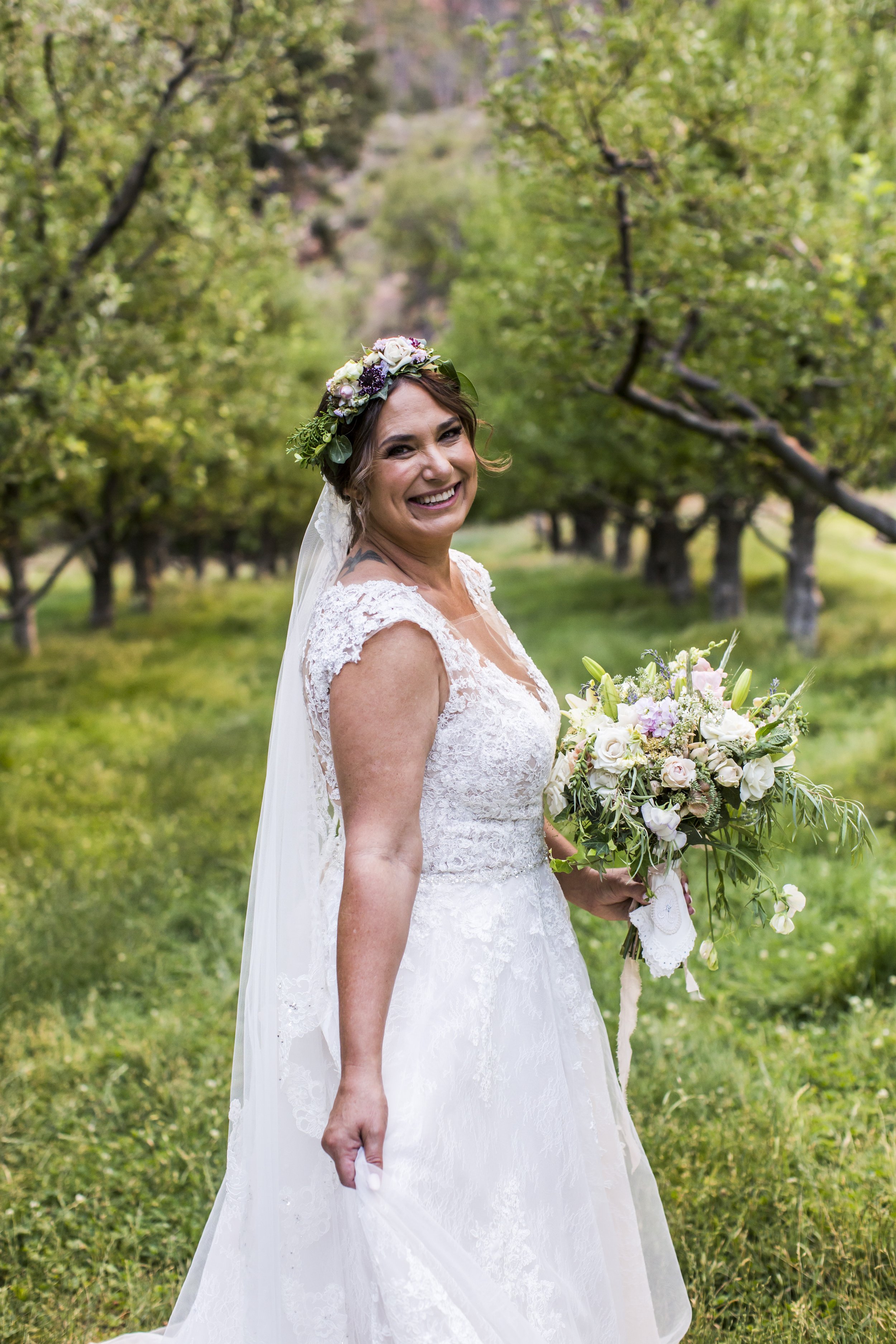 Romantic summer solstice orchard wedding bride
