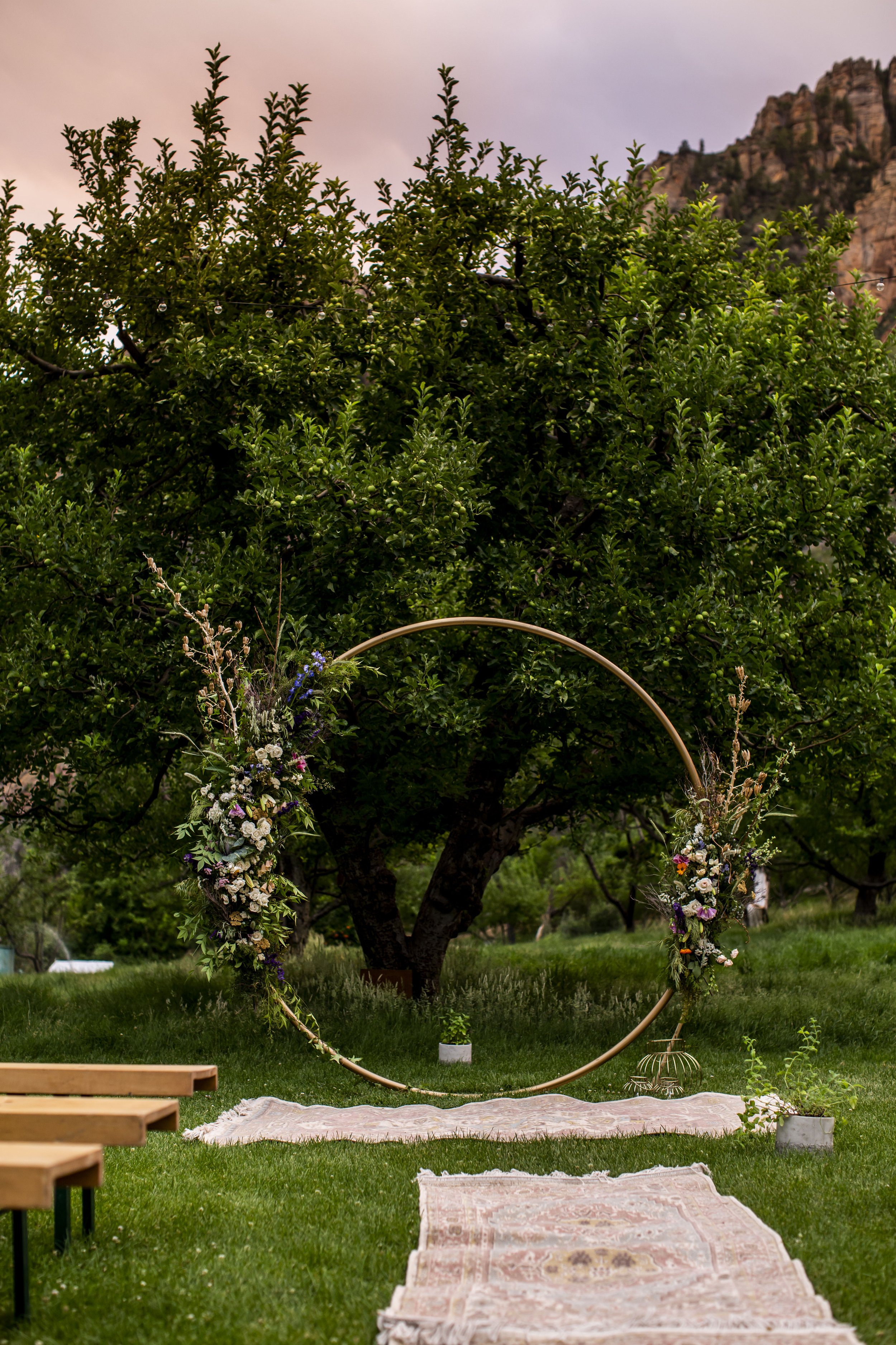 Romantic summer solstice orchard wedding arch