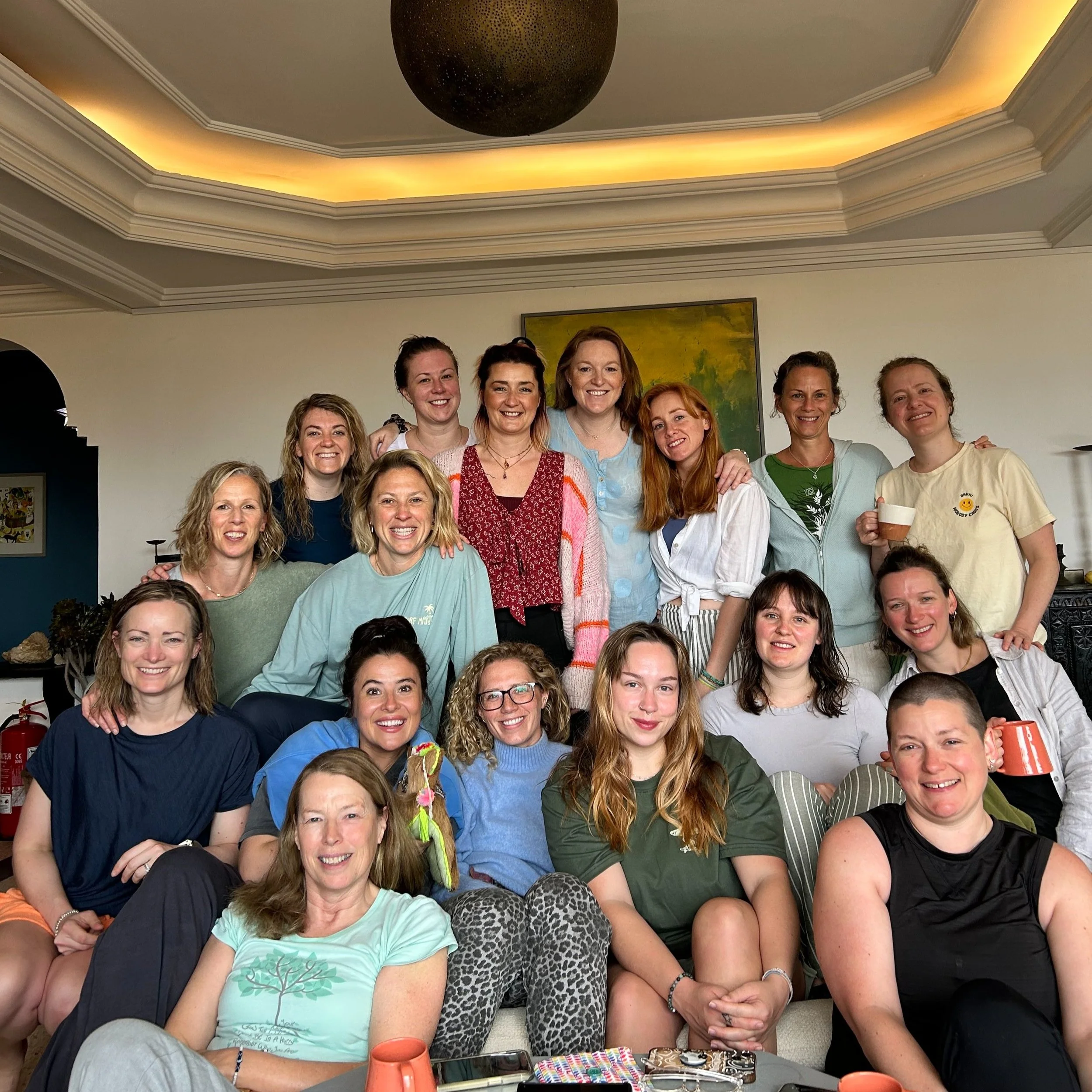 Group of women smiling and looking happy