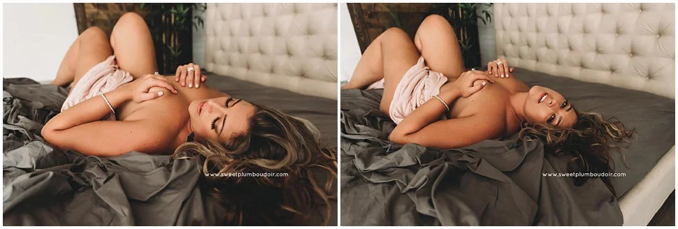 ash blond girl naked on the bed covering her boobs with her hands.