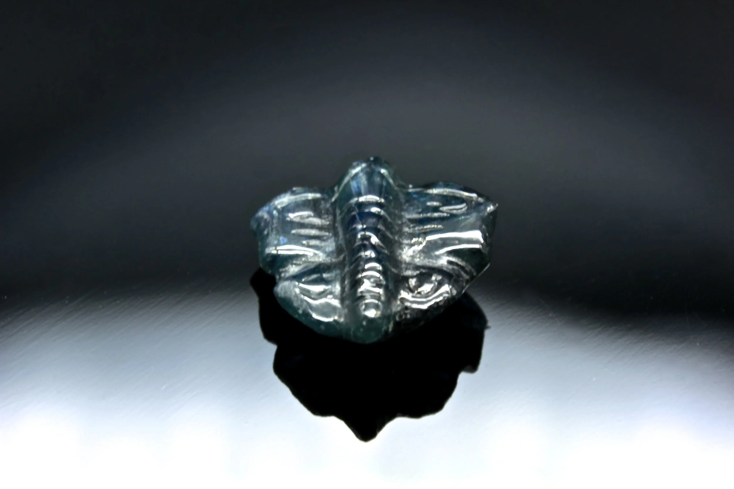 A Deep Blue Sapphire Butterfly Carving