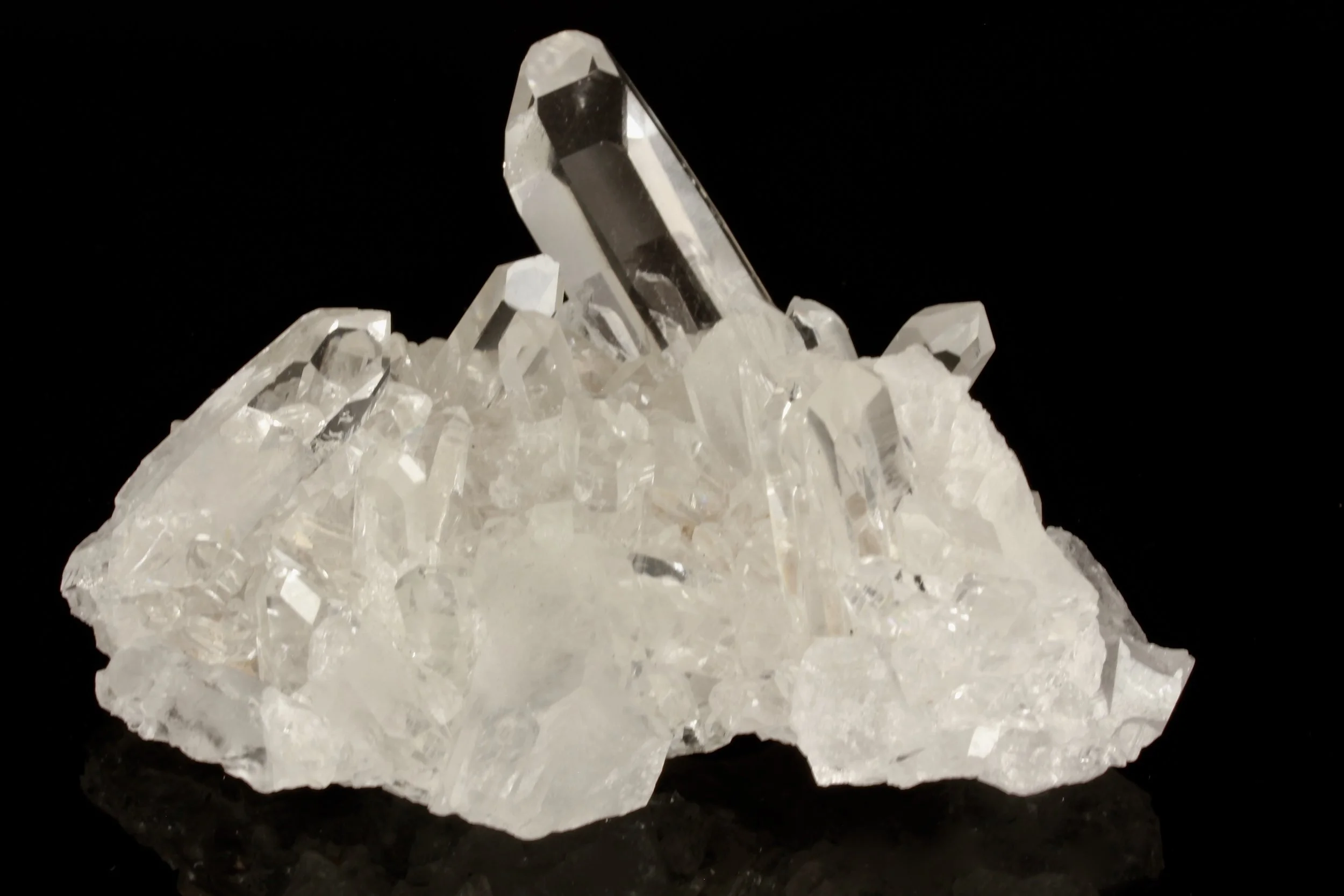 A clear Quartz cluster with a left sided Portal (Sold)
