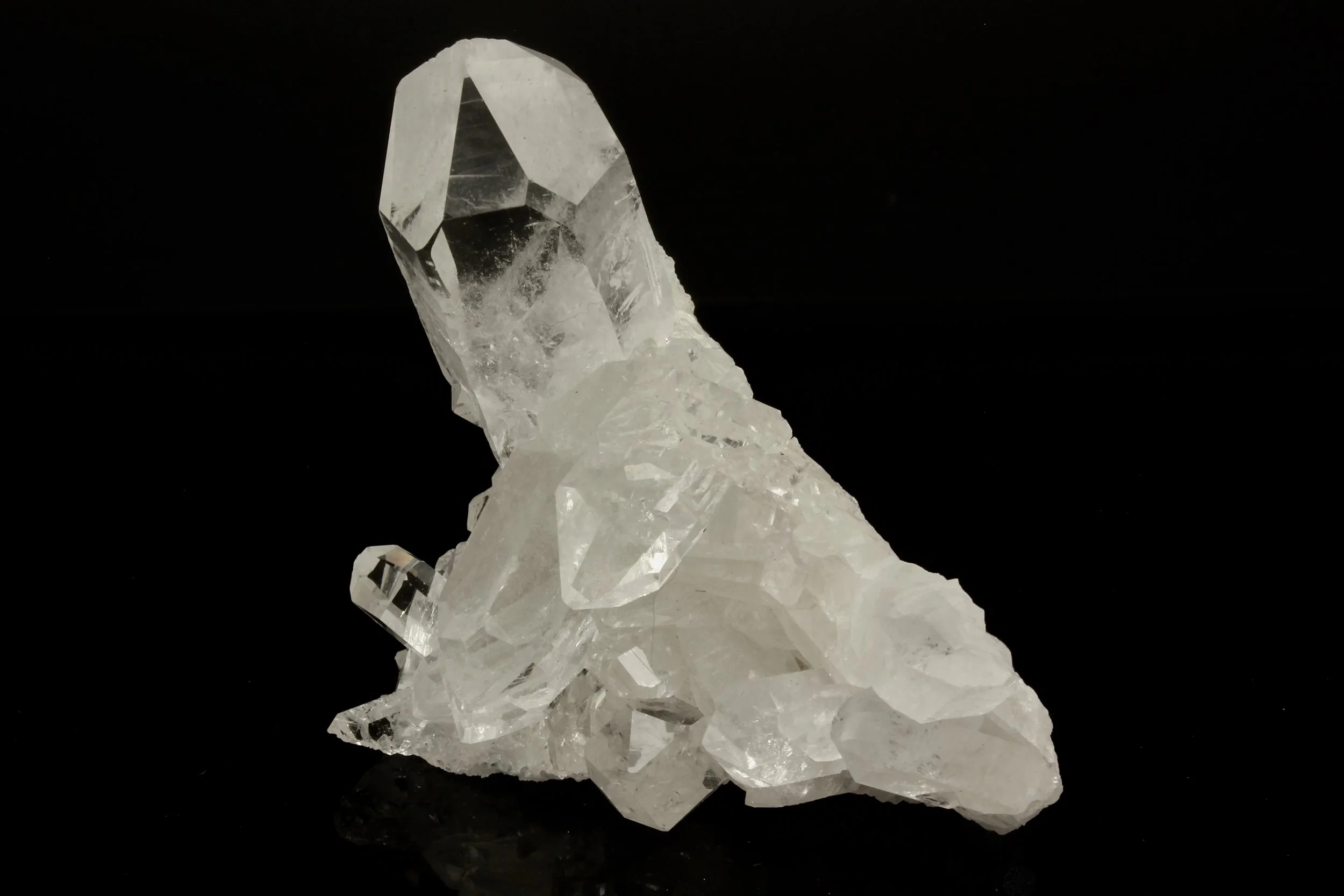A Clear Quartz cluster with a Sceptre point and two left sided Portals (Sold)