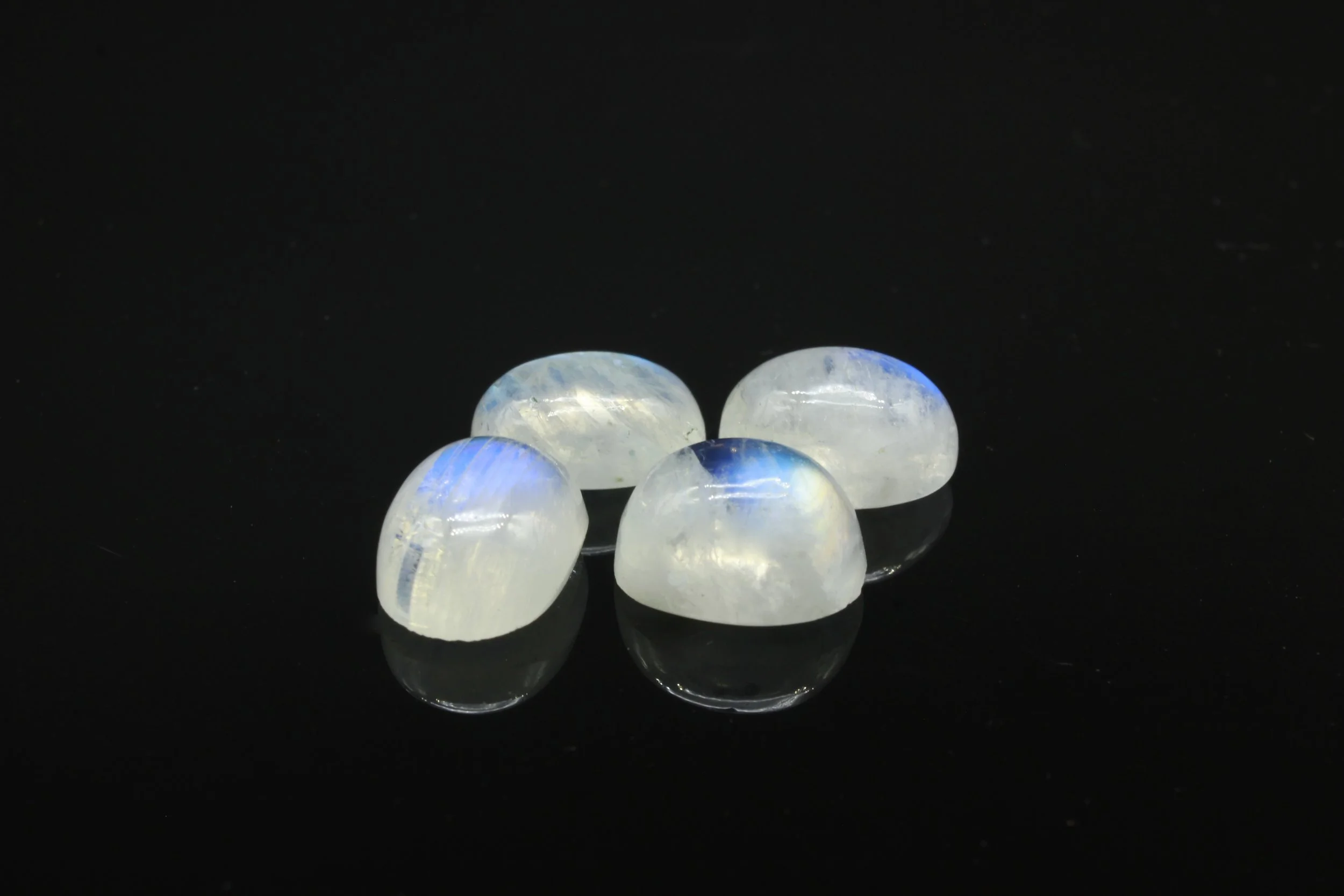 A collection of bright Spectrolite Moonstone cabochons