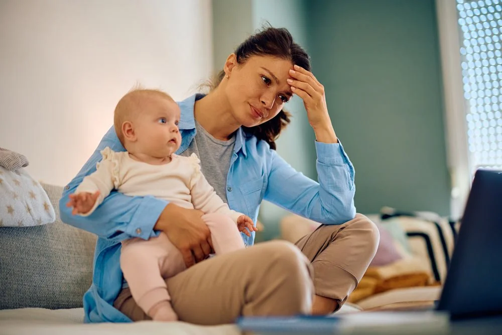 Distressed mother with baby -Postpartum Rage: Why It Happens and What Helps