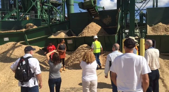 Group of attendees tour Forest Energy Corporation