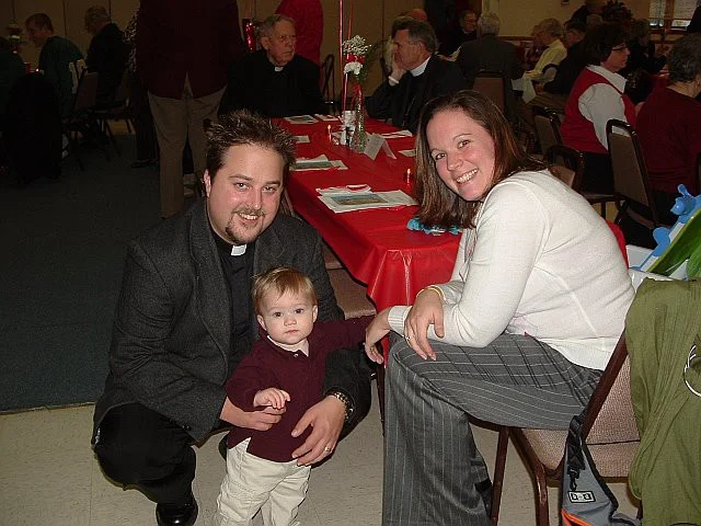 Rebekah (age 11 months) with me and her father