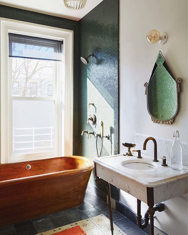 Teak bathtub and bathroom hues envy of Maggie Gyllenhaal via Architectural Digest.
