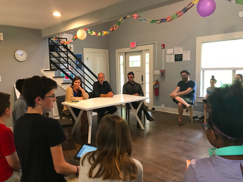 Learners (ie “Consultants”) from the Middle School Studio pictured above empathizing with leaders of Pinewood Forest (ie “Clients”) to understand their challenges and desires regarding the Pinewood Forest Spring Marketfest.