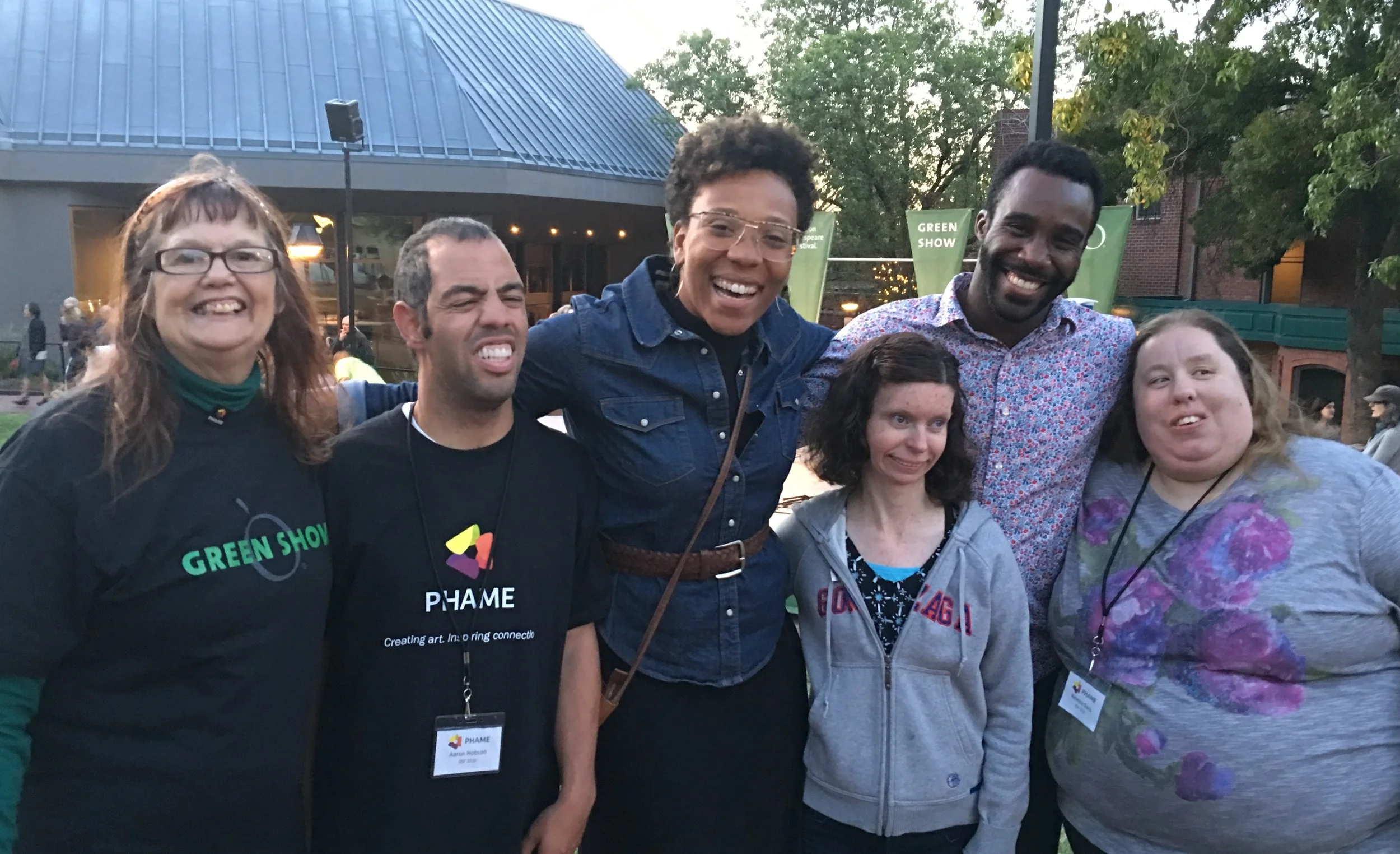 Group of PHAME community members smiling at the camera