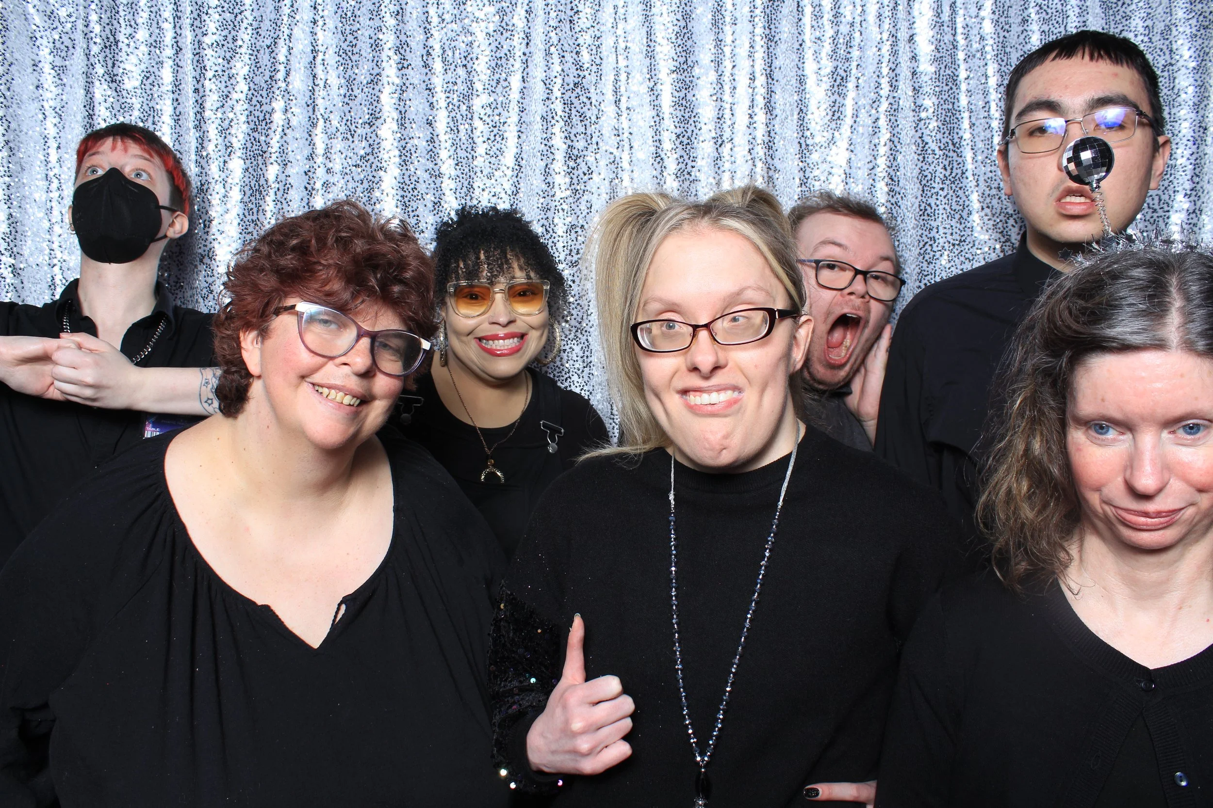 A series of playful photo booth images featuring PHAME community members posing together with reflective backdrops and props.