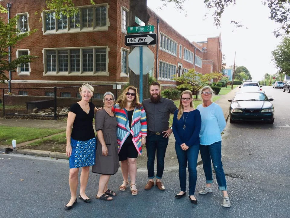 Jodi (on left) with members of the Tree Streets Traffic Mural Committee. 
