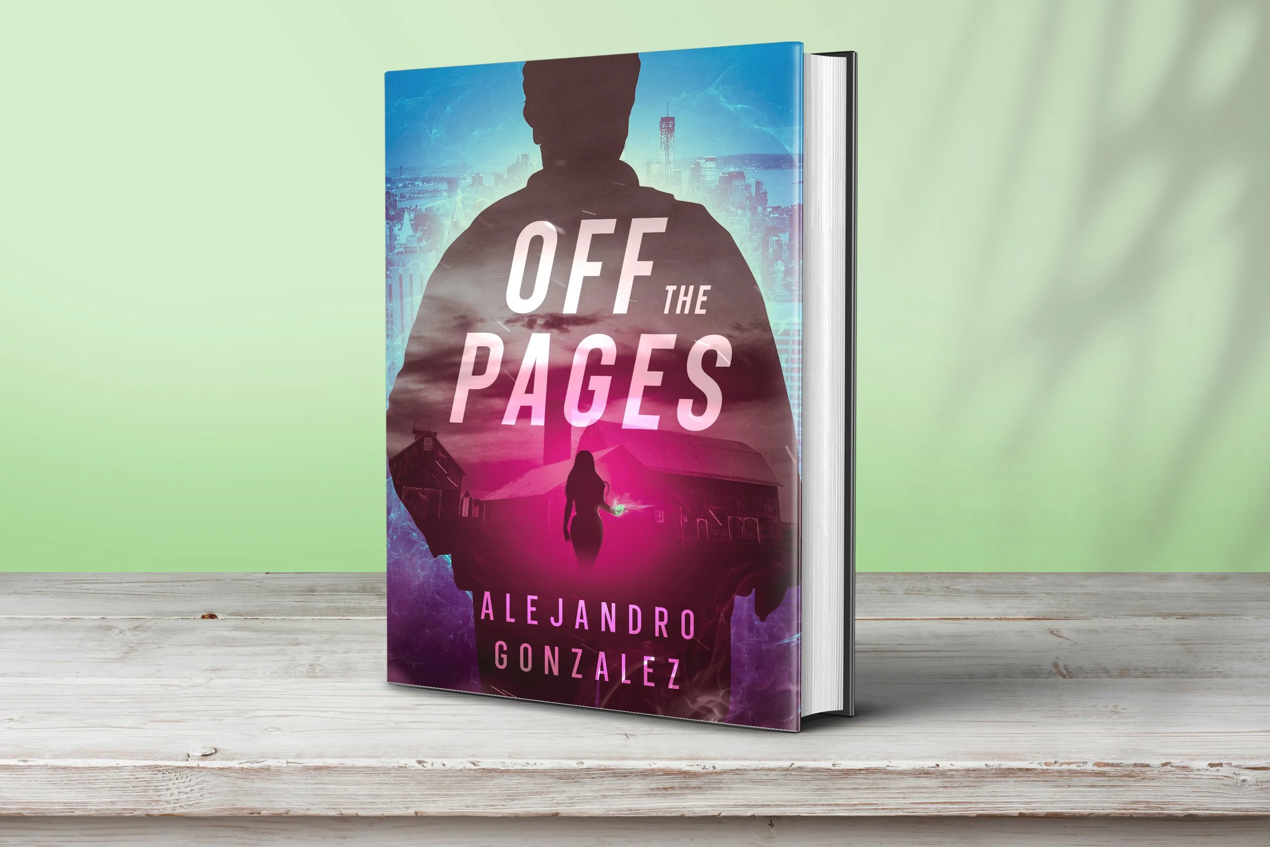 An image of a book on a desk with the Off The Pages cover on it.