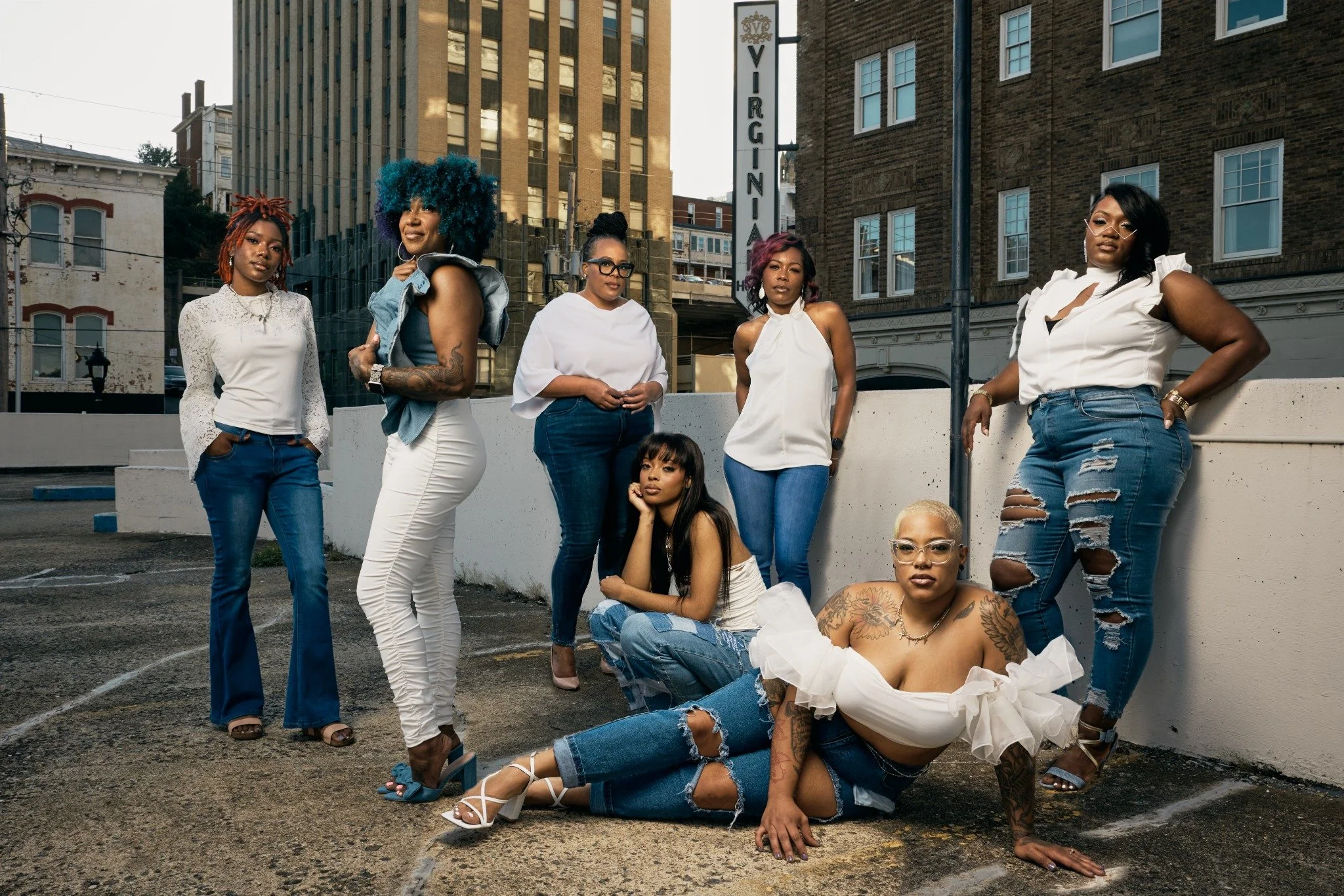 Vanquish Beauty Studio team photographed in downtown Lynchburg, Virginia.