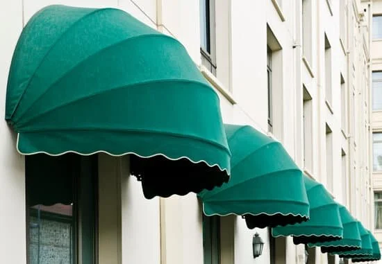 canva-green-awnings-over-windows-in-hotel-wall-MADarM4S3bQ.jpg