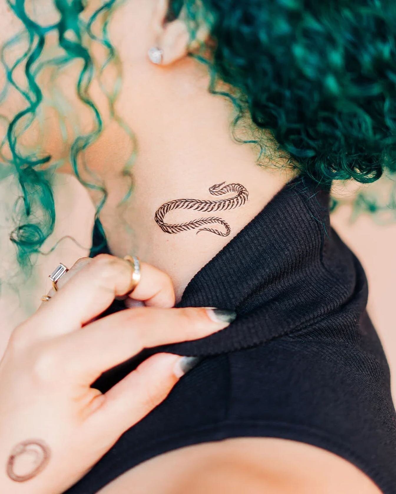 @tattly printed these *gorgeous*  versions of my little grass snakes as a temporary tattoo pack. They are translucent so they have a natural look as the skin comes through. They also took these incredible photos 😍. 
.
They&rsquo;re available on tatt