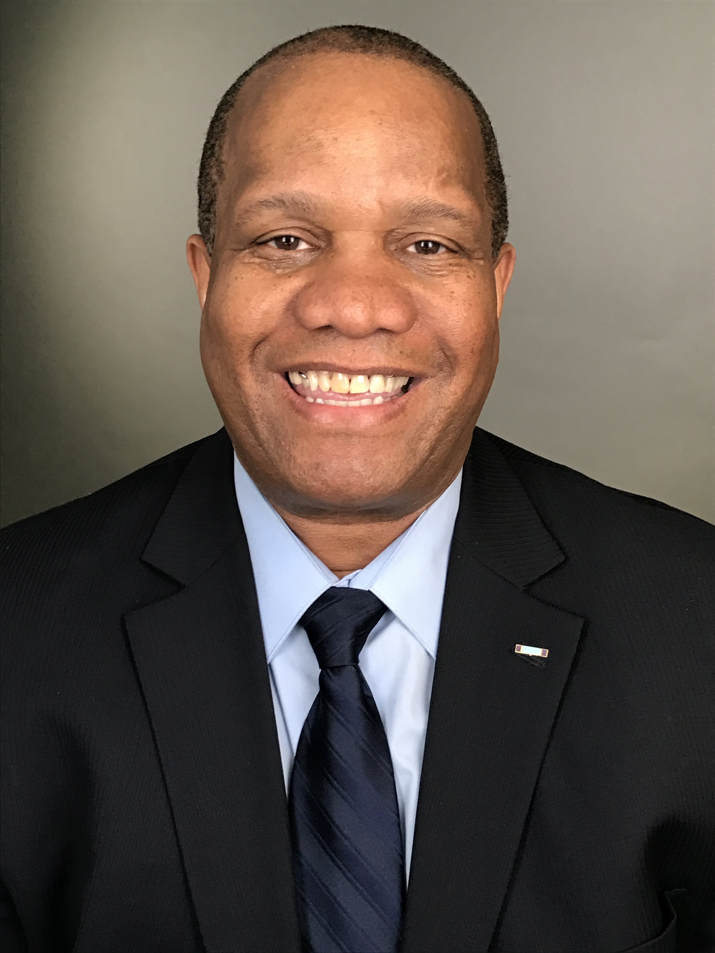 Patton Headshot Dark BG.JPG