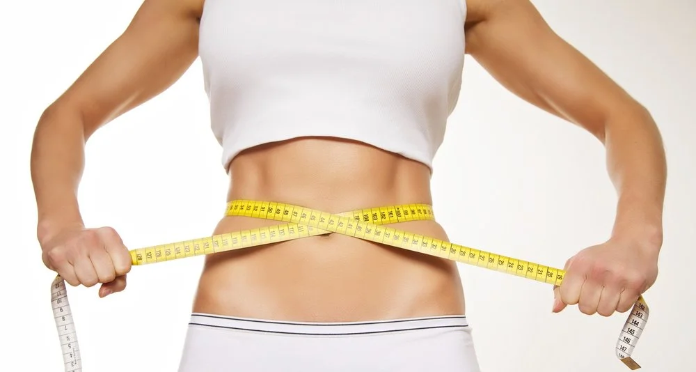 fit-beautiful-woman-holding-measure-tape-around-her-stomach-weight-loss-concept_HaGA1INYx.jpg