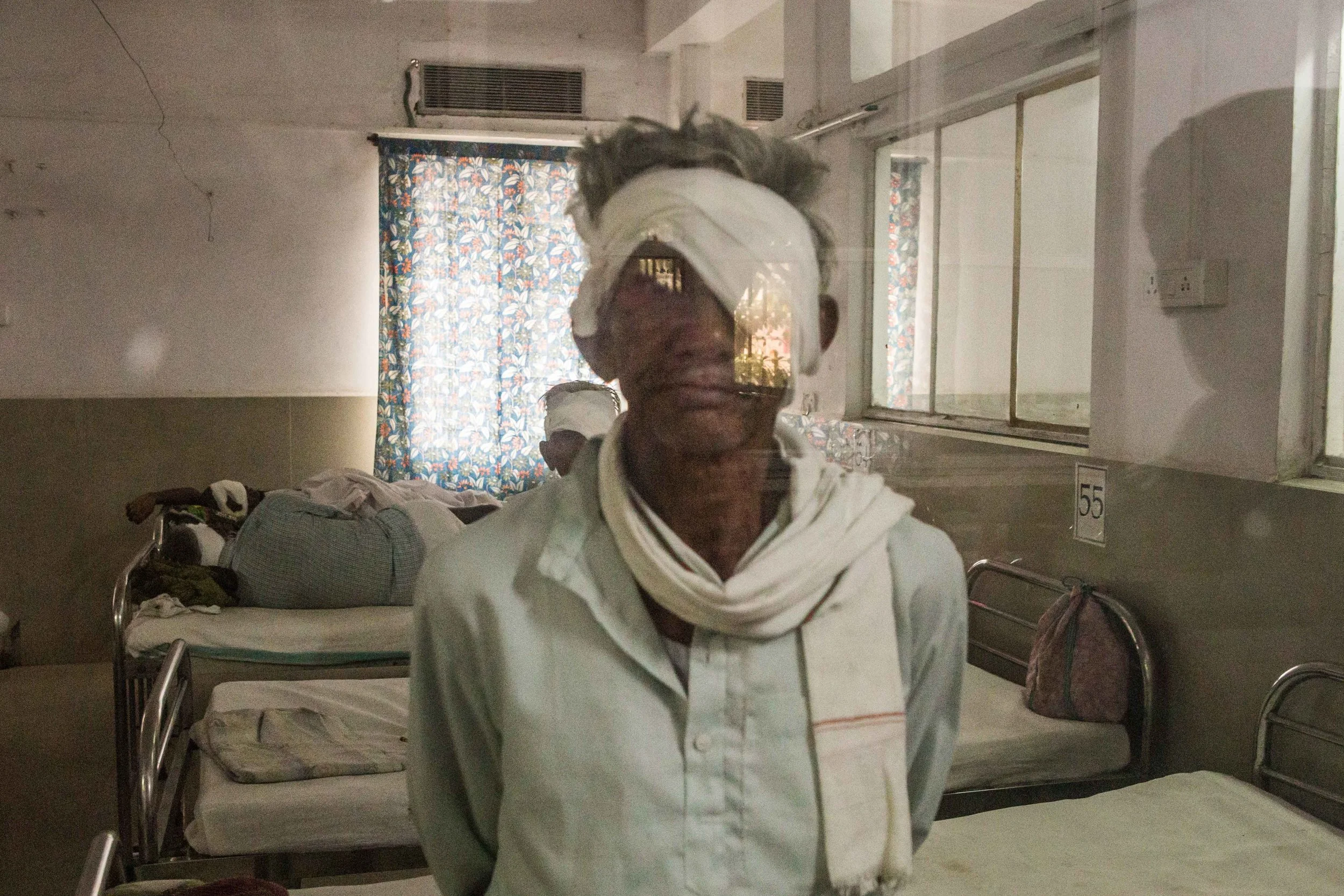 A patient waiting for his discharge after an eye operation. District Hospital Wardha, Maharashtra