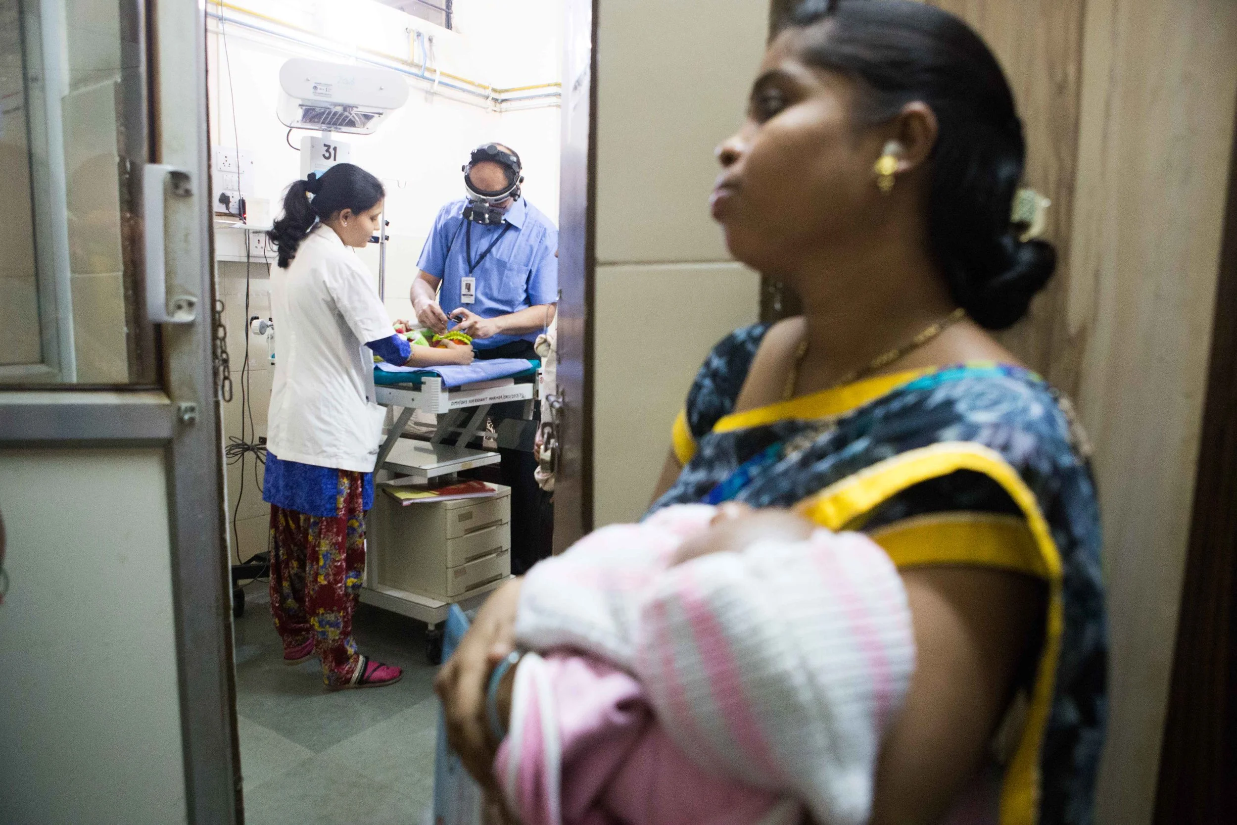 A mother waits for her babies turn for ROP screening. Daga Hospital, Nagpur, Maharashtra