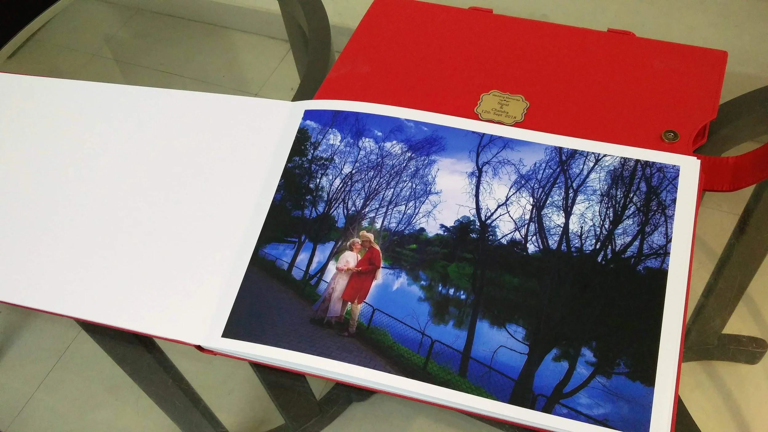 A Flush Mounted Canvera Album with a faux leather sleeve to keep it safe