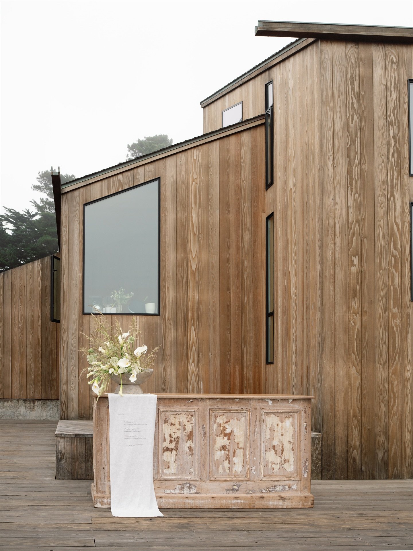 A beautifully moody and romantic day @thesearanchlodge with the most amazing team 🕊️ &mdash;

Photography: @wildpinescollective 
Hosts: @wildpinescollective @savannahbphotos 
Planner: @rivieracreative_
Florals: @rbt_florals 
Stationery + Signage: @l