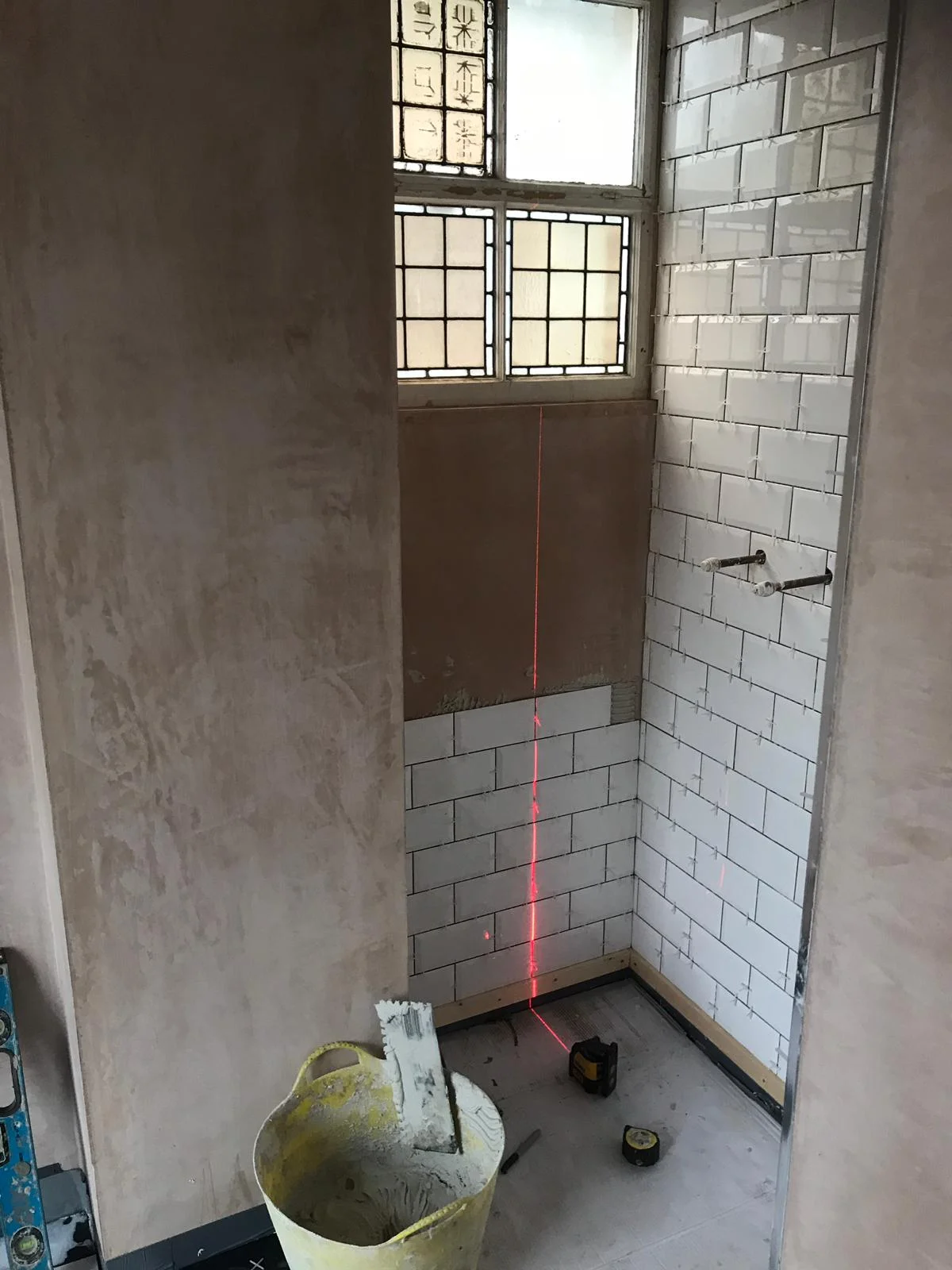 Warburton During Wetroom Tile 2.JPG