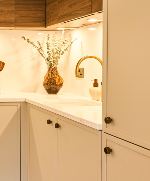 Micro Shaker in Porcelain paired with walnut wall cabinets