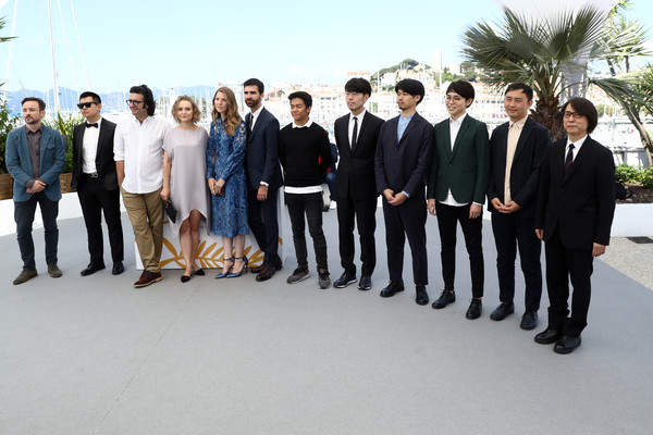 (L-R) Charles Williams, Wei Shujun, Saeed Jafarian Tariki, Marta Pajek III, Celine Held, Logan George, Raymund Ribay, Kawamura Genki, Toyota Masayuki, Hirase Kentaro, Seki Yutaro and Sato Masahiko attends Realisateurs Des Courts Metrages 2018 Photocall during the 71st annual Festival de Cannes at Palais des Festivals on May 18, 2018 in Cannes, France.
