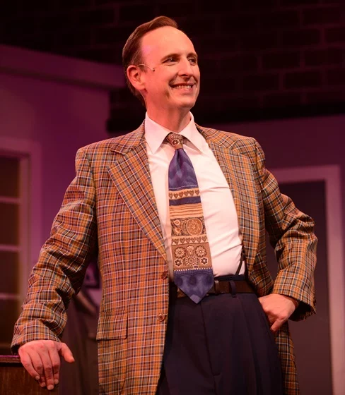 J. Sean Elliott as Sam Phillips in Million Dollar Quartet.