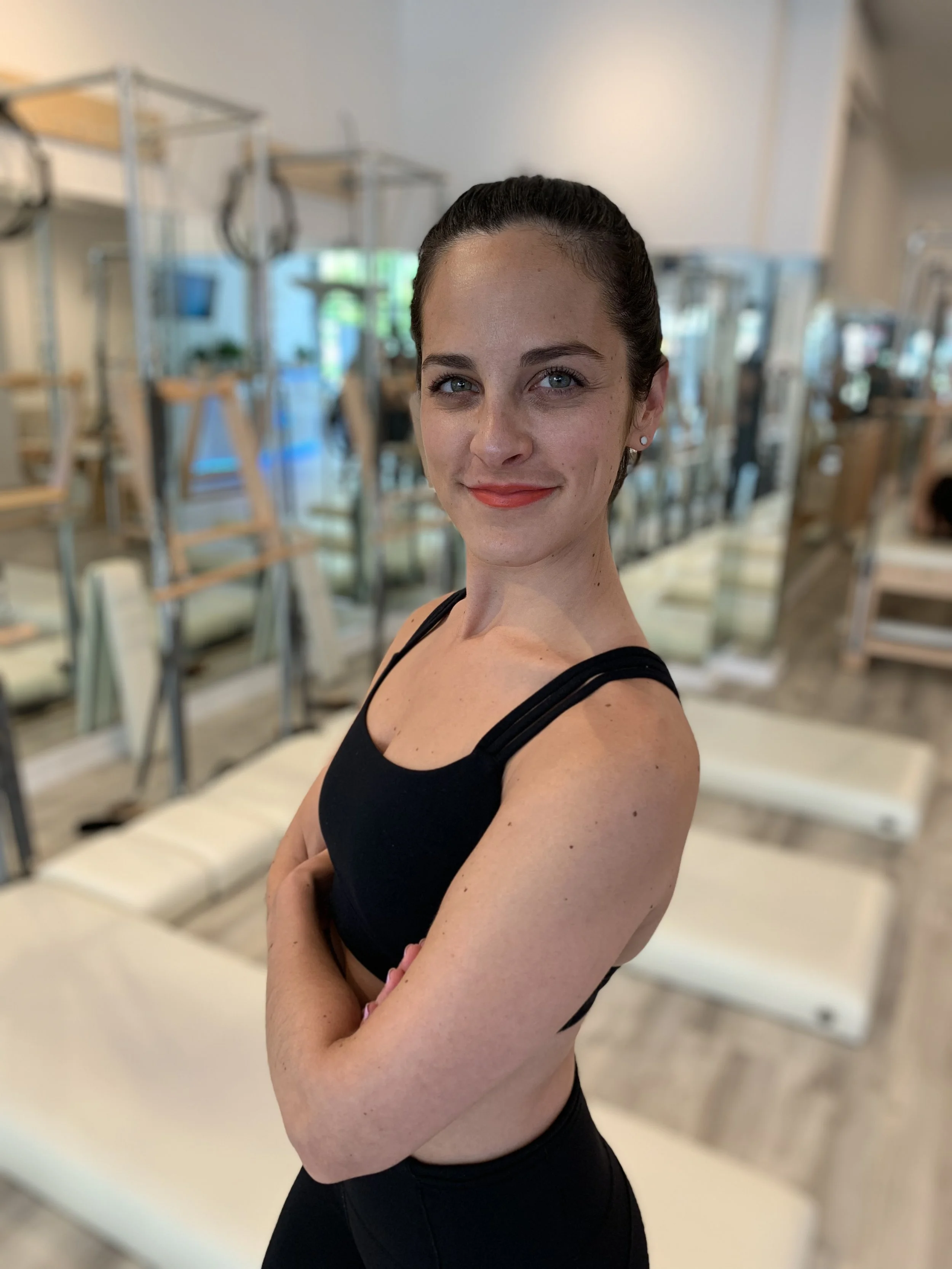 Sarah Sarah loves Pilates because it’s an amazing workout for everyone! She works with a wide range of clients including pre and post natal, those with injuries, beginner and advanced clients, and people of all ages. She loves to utilize all of the classical equipment so her clients can get the most out of their session. Sarah likes to focus on the technique of the exercise first and then continue to execute with flow. She is able to assess a client and quickly adapt to their specific need. Sarah is also happy to target an area a client would like to focus on - after all this is your workout! Her clients will tell you she has a bubbly personality that is infectious. Having fun while we work out? Yes please!