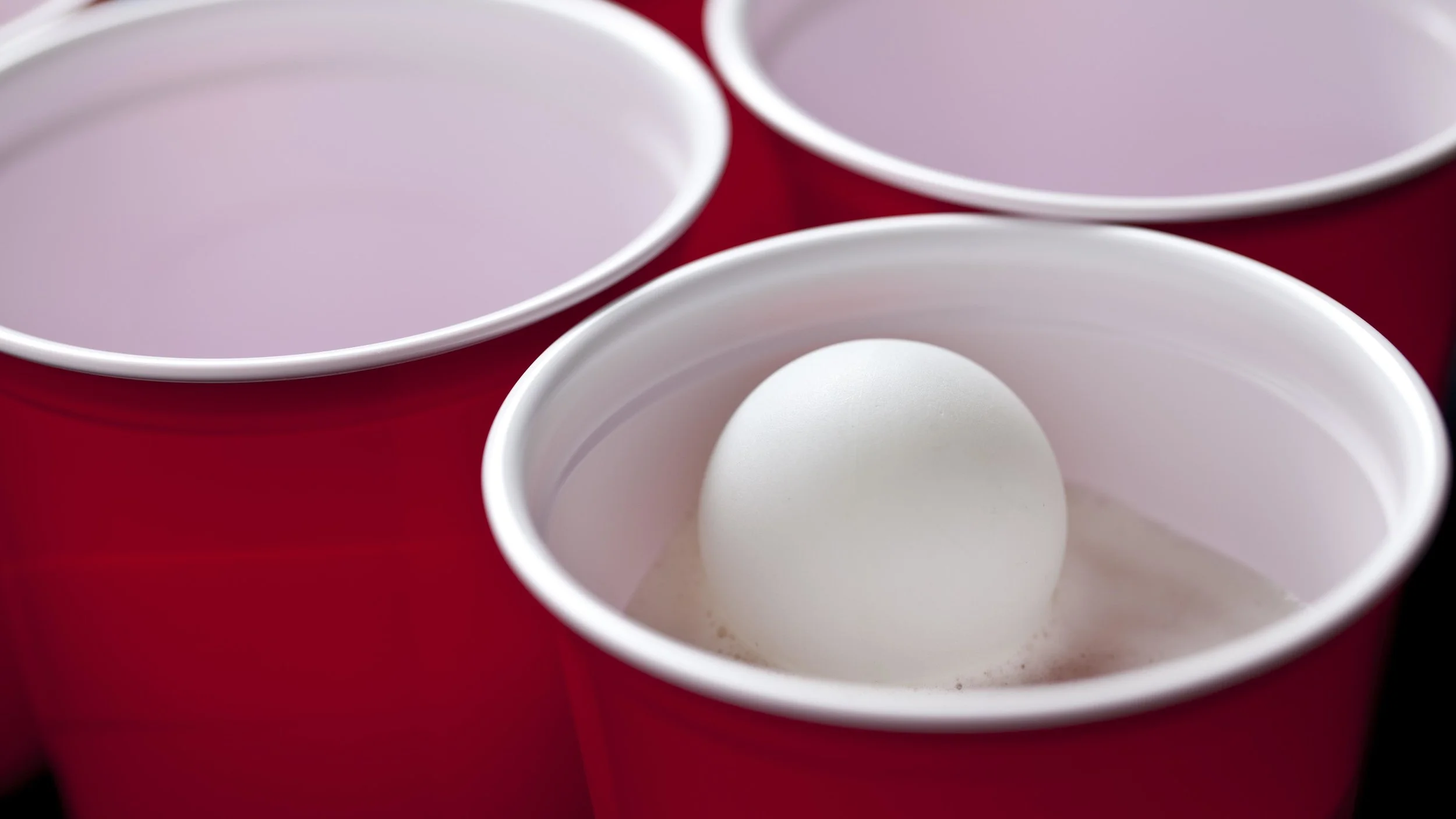 Beer Pong Ball in a Cup.jpeg