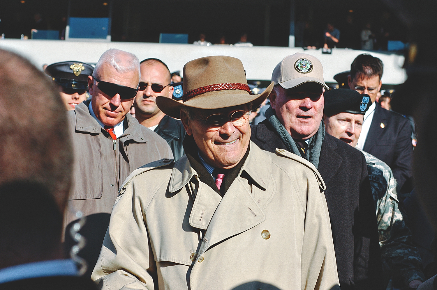 12-donald-rumsfeld-walks-down-stadium-during-army-navy-game.jpg