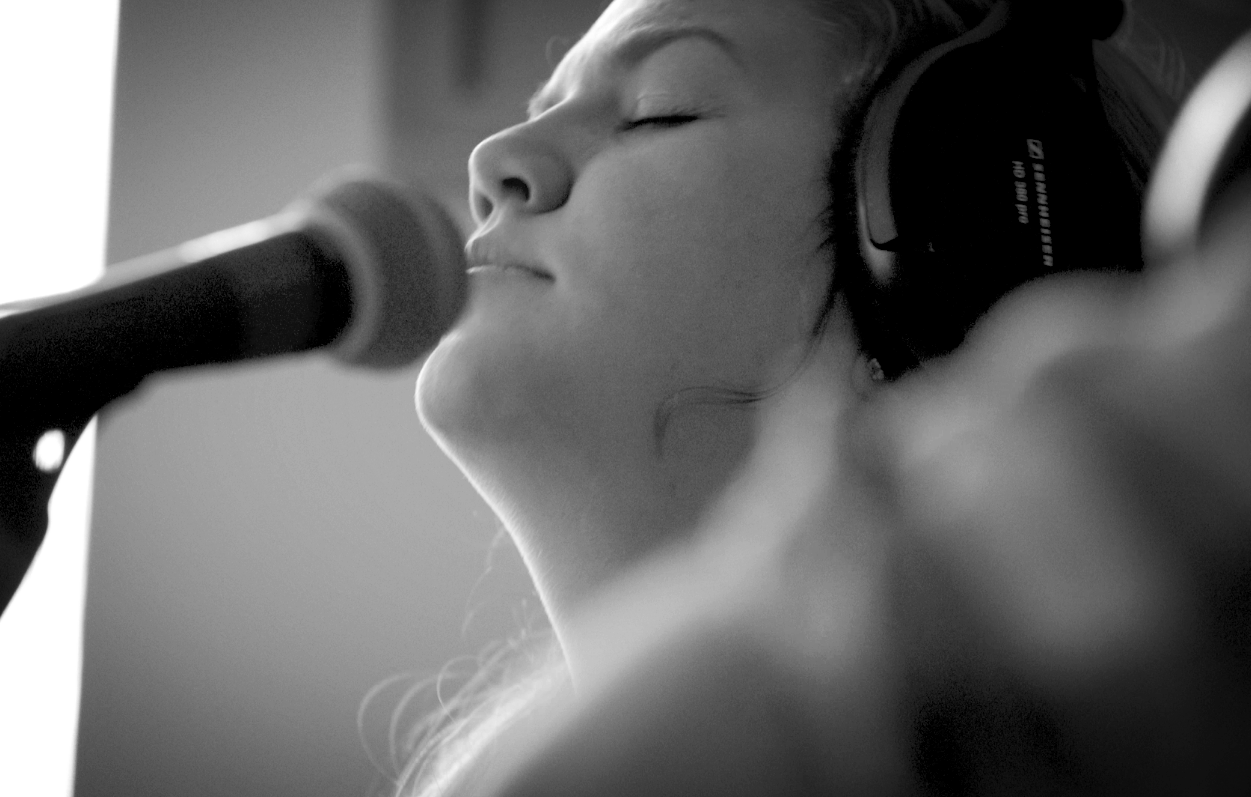 Caitlin singing.png