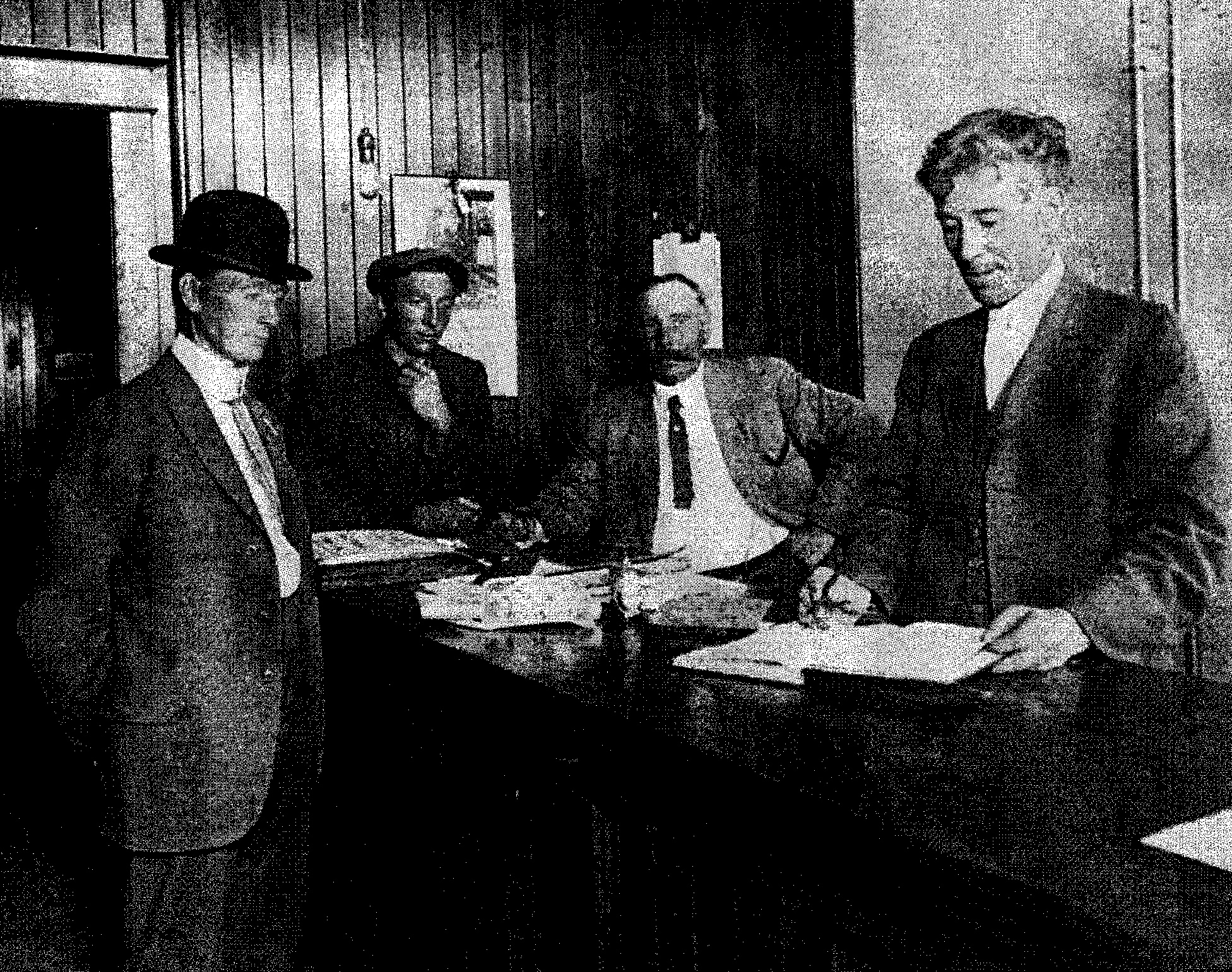 Dick Askew (hand at neck) at the Kamloops Land Registry Office in 1913