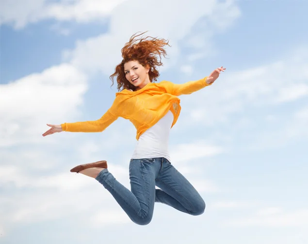 yellow shirt jumping with jeans on.jpg