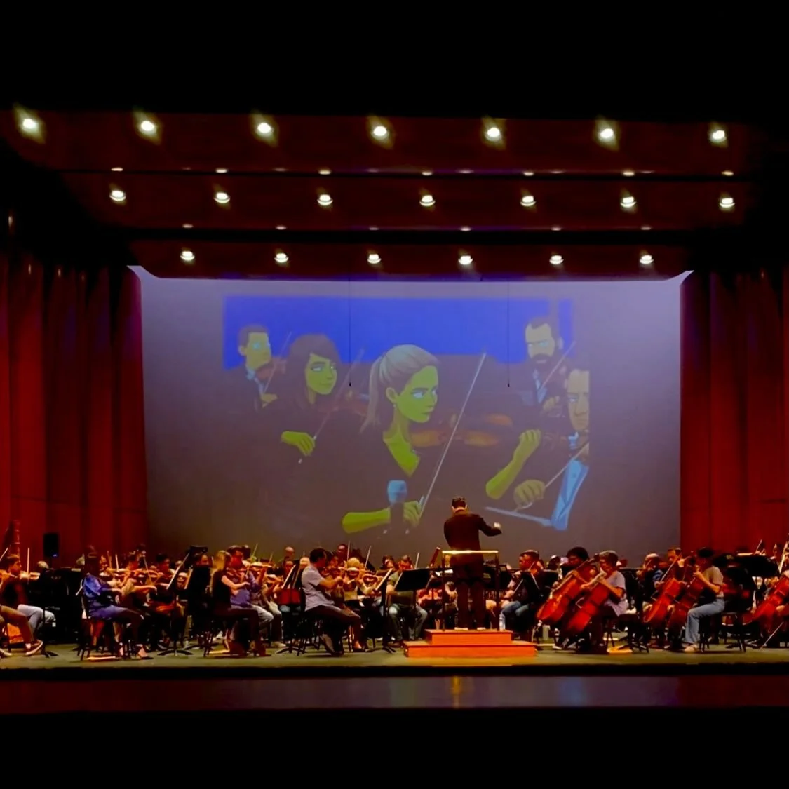 Such a fun week with the Venice Symphony playing pops TV classics! Our amazing production manager Simpson-ized the orchestra in photos shown during the concerts &mdash; hence me on the big screen above the orchestra 😂