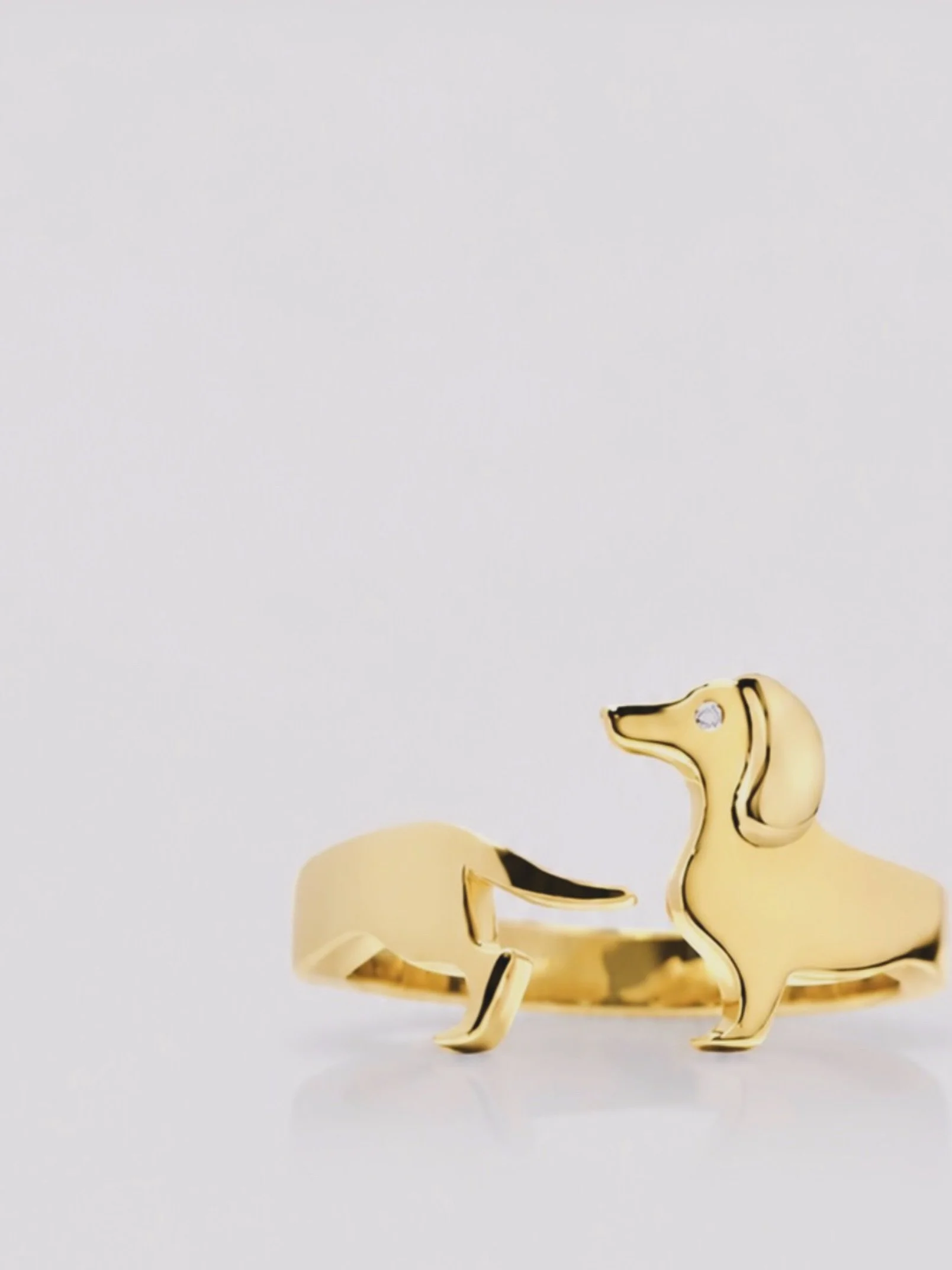 When you love your little sidekick more than life itself, you simply have to keep them close. 🐾✨

A Dachshund ring to wrap around your finger... and that little twinkle in his eye? A diamond, of course.

For the dog lovers who know they&rsquo;re fam