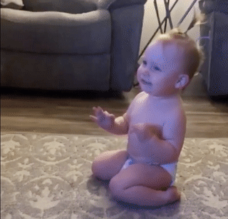 Baby Bottle Flip.gif