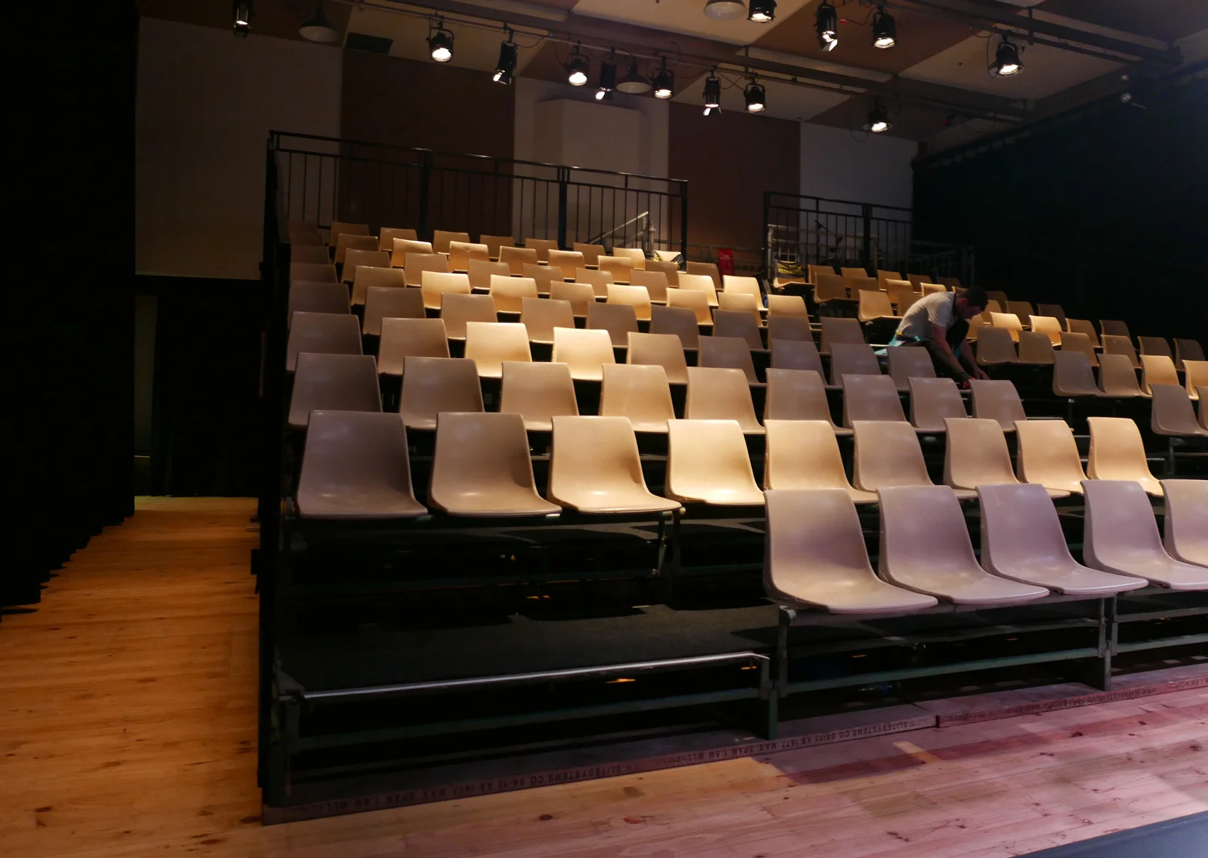 Tiered seating of the rehearsal room. Configurations change as needed.